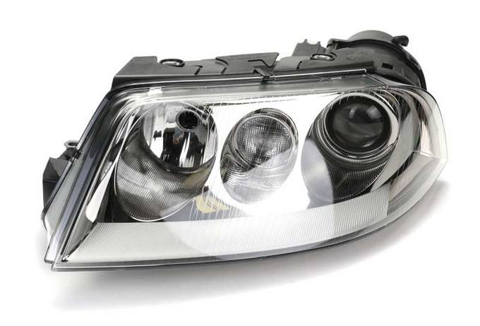VW Headlight Assembly - Driver Side (Xenon) 3B7941017T - Hella 008340235